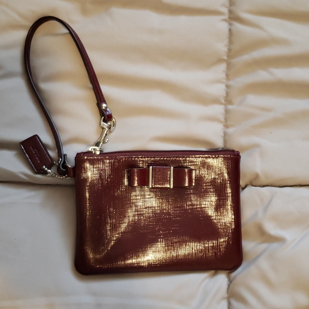 Coach burgundy wristlet wallet